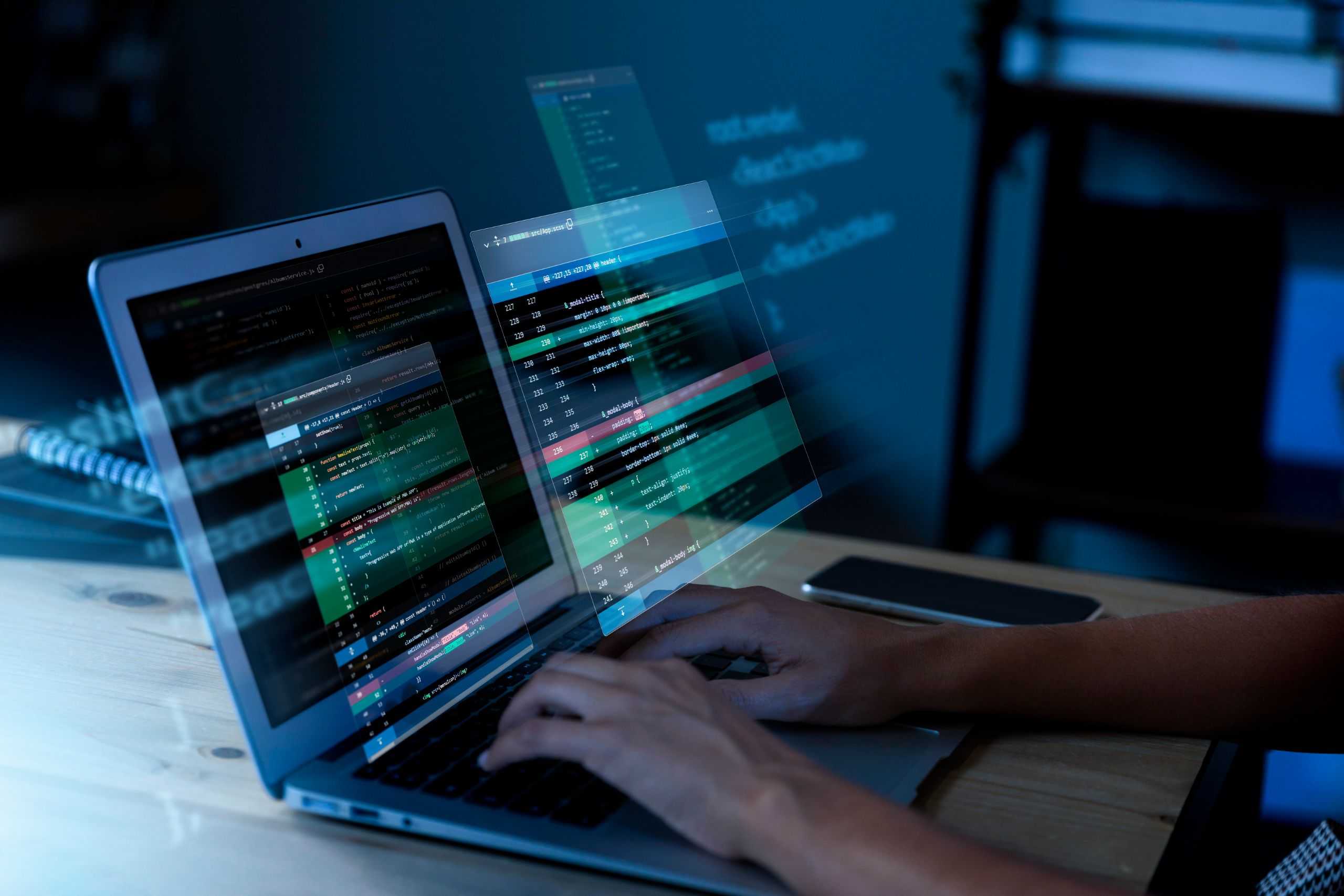 Person coding a computer